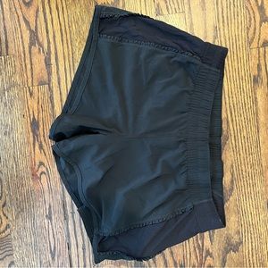 Lululemon black shorts. Cute ruffle detail